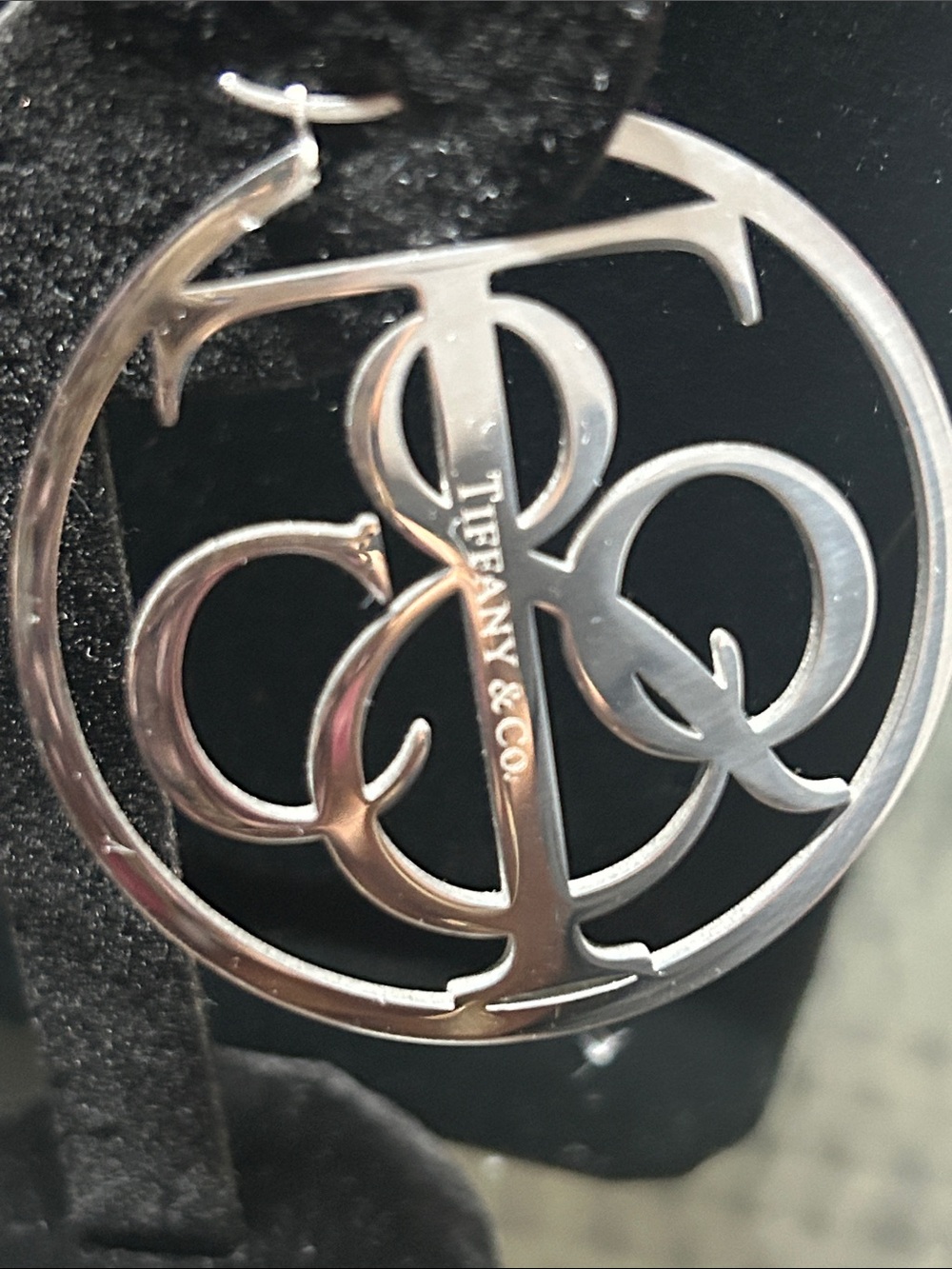 Polished Silver-Tone Hoop Earrings with Interlocking Emblem